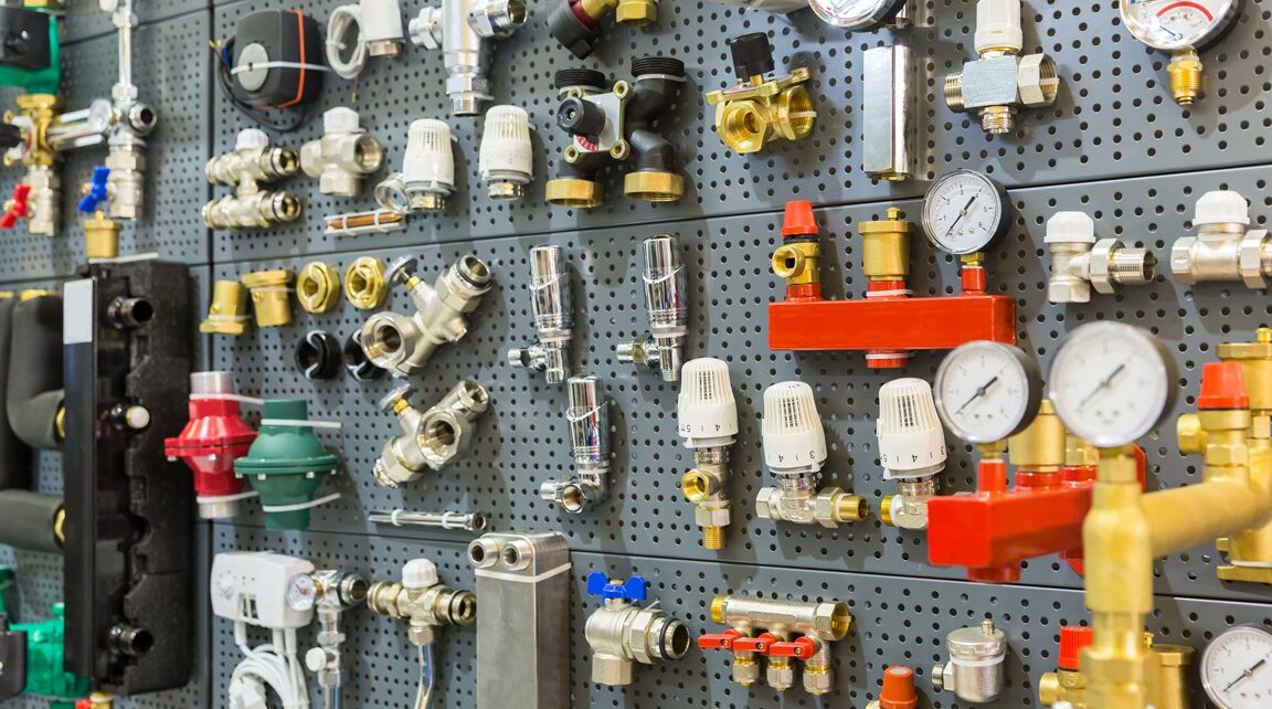 Plumbing equipment, pressure sensors and thermostat. Valves and tools